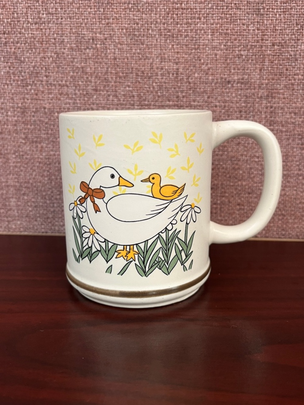 1980s ceramic coffee mug featuring a cute mother duck and duckling.